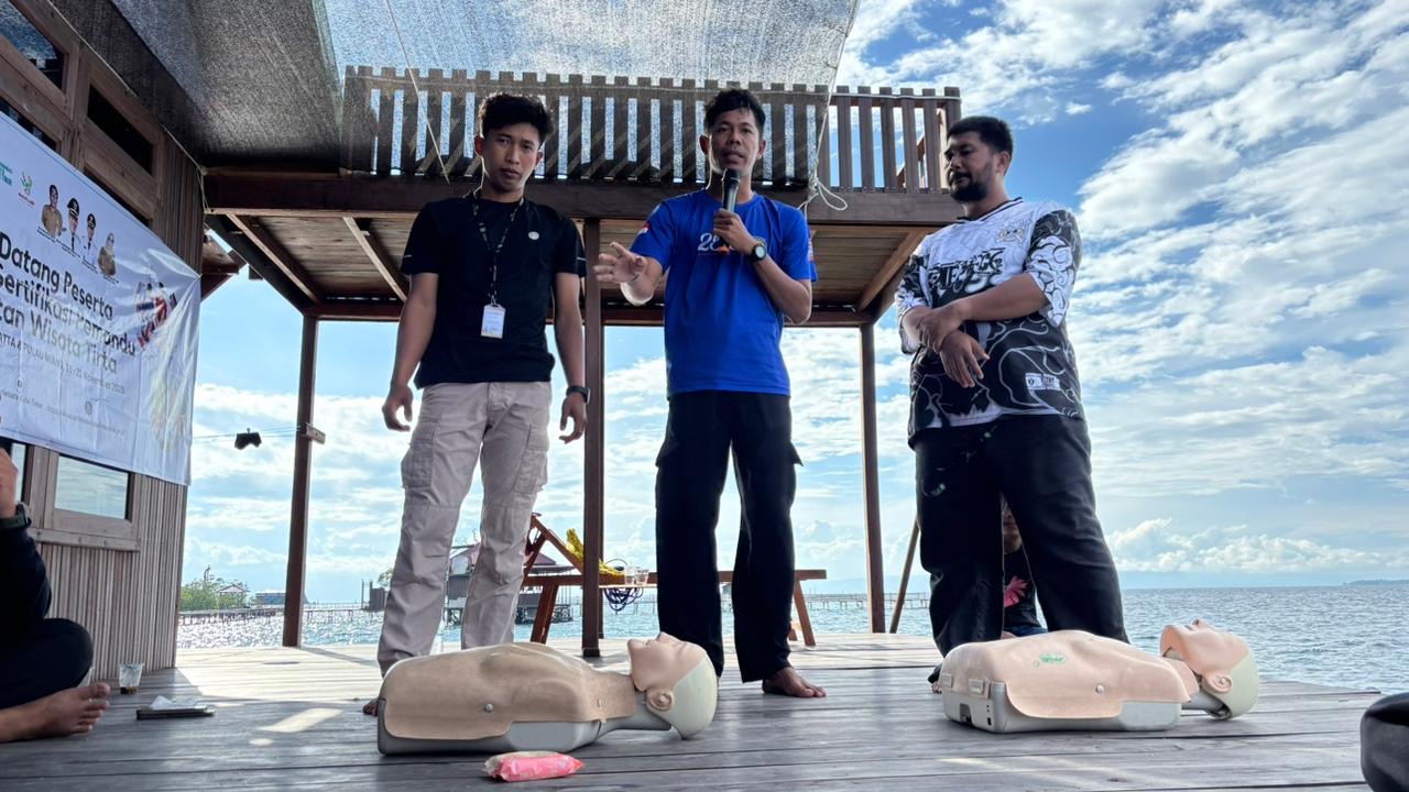 Kamarun demonstrating CPR techniques.